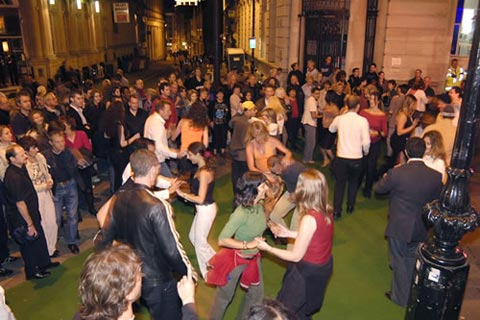 Dancing in the street at night